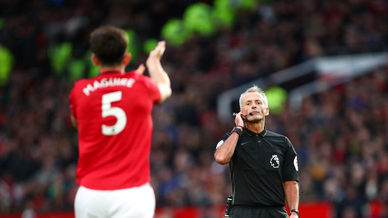 Referee Martin Atkinson during the match between Manchester United and Liverpool