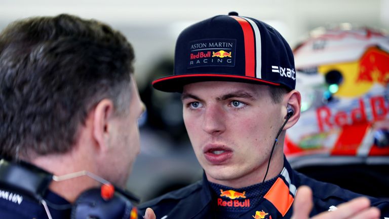 Red Bull Team Principal Christian Horner talks with Max Verstappen during the Mexico GP.