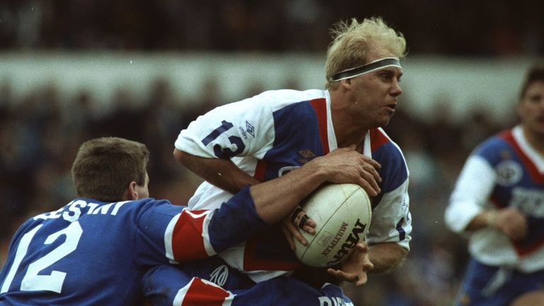 7 Apr 1990: Mike Gregory of Great Britain is tackled during a match against France. France won the match 25-18. \ Mandatory Credit: Gray Mortimore/Allsport