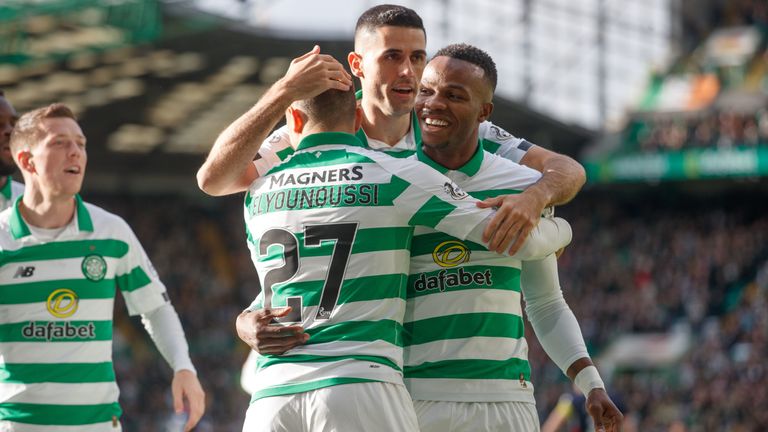 Celtic's Mohamed Elyounoussi (centre) celebrates scoring his side's first goal