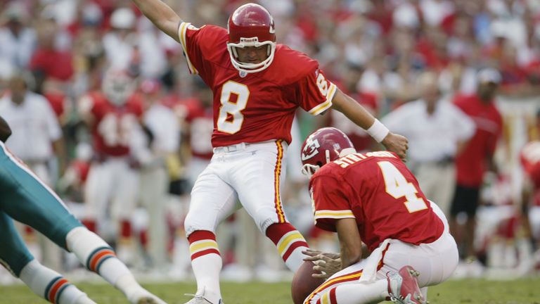 Placekicker Morten Andersen #8 of the Kansas City Chiefs kicks out of a hold by punter Dan Stryzinski #4 during the NFL game against the Miami Dolphins on September 29, 2002 at Arrowhead Stadium in Kansas City, Missouri. 