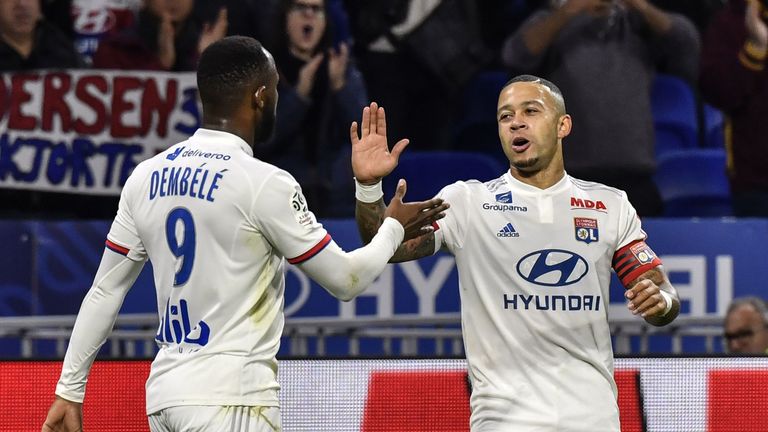Dembele and Depay were both on target for troubled Lyon