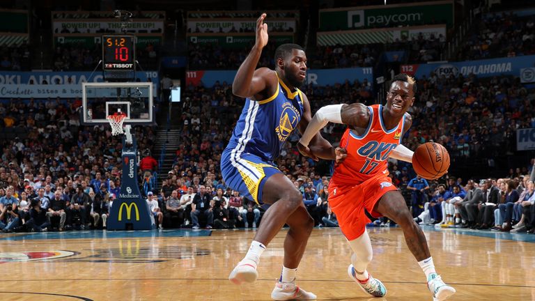 Dennis Schroder of the Oklahoma City Thunder drives towards the basket against Golden State Warriors