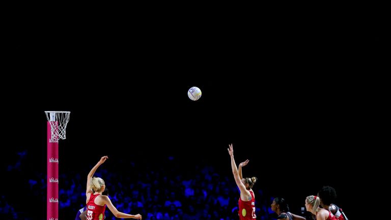 Jo Harten putting up a shot for England during the Netball World Cup