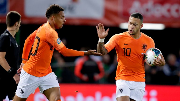 Depay celebrates a goal for the Netherlands