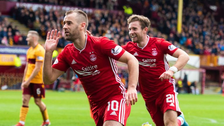 Niall McGinn is pictured celebrating making it 2-0 to Aberdeen at Motherwell