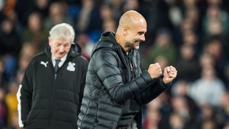 Pep Guardiola celebrates during Manchester City's win at Crystal Palace