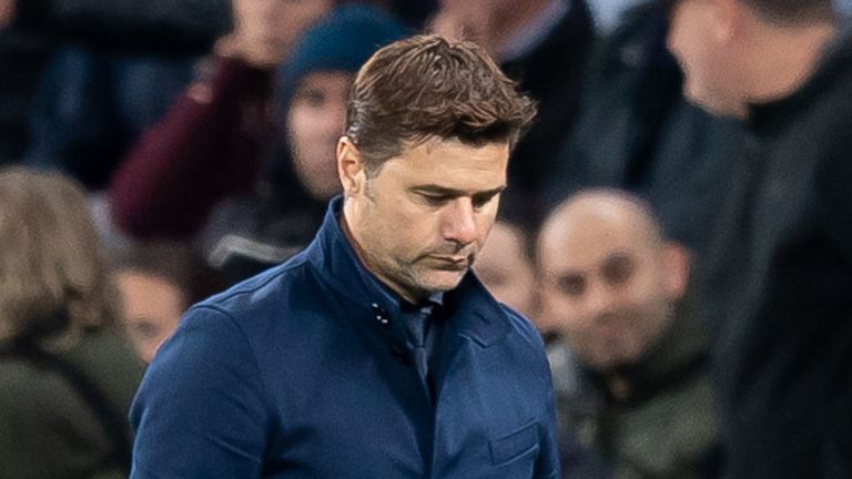 Tottenham&#39;s Mauricio Pochettino walks off following the 7-2 rout by Bayern in the Champions League.