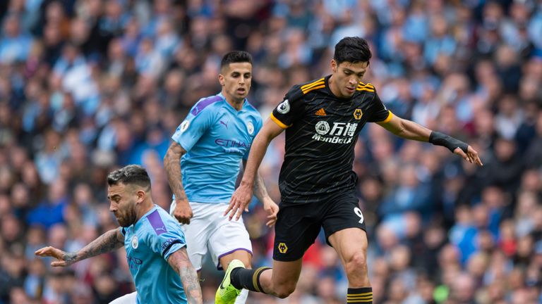 MANCHESTER, ENGLAND - OCTOBER 06: Raul Jimenez of Wolverhampton Wanderers skips past Nicolas Otamendi of Manchester City during the Premier League match between Manchester City and Wolverhampton Wanderers at Etihad Stadium on October 6, 2019 in Manchester, United Kingdom. (Photo by Visionhaus) *** Local Caption *** Raul Jimenez; Nicolas Otamendi