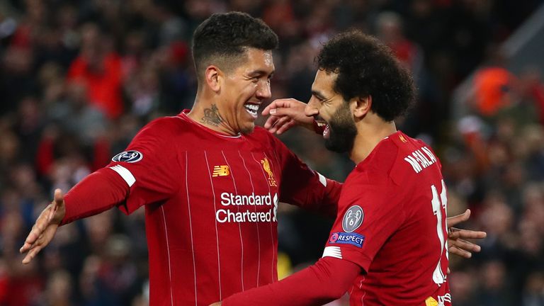 Roberto Firmino and Mohamed Salah celebrate during the Salzburg win