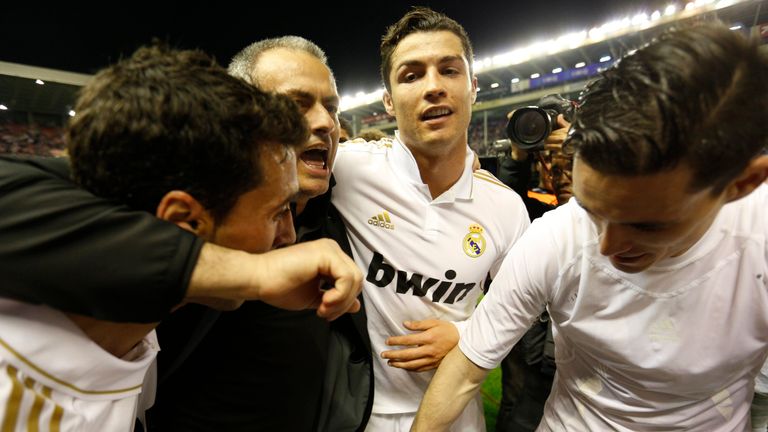 Cristiano Ronaldo celebrates with Real Madrid manager Jose Mourinho after winning the La Liga title in 2012