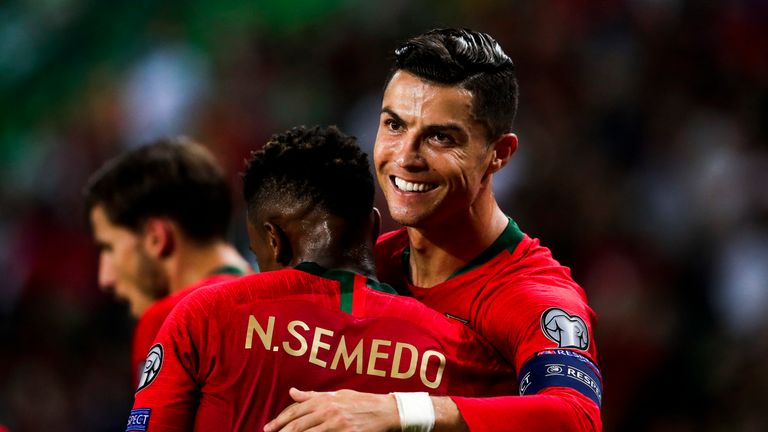LISBOA, PORTUGAL - OCTOBER 11: (L-R) Nelson Semedo of Portugal, Cristiano Ronaldo of Portugal celebrates goal 2-0 during the UEFA Nations league match between Portugal v Luxembourg at the Estádio José Alvalade (Lisboa) on October 11, 2019 in Lisboa Portugal (Photo by David S. Bustamante/Soccrates/Getty Images)