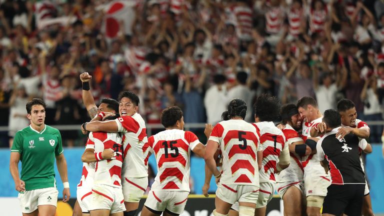 Joey Carbery looks on as Japan celebrate another World Cup upset