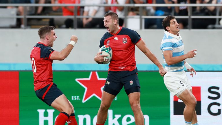 Jonny May celebrates with George Ford after scoring England's first try against Argentina