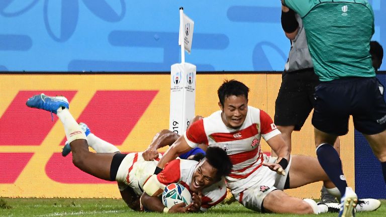 Kotaro Matsushima scores Japan's bonus-point try against Samoa