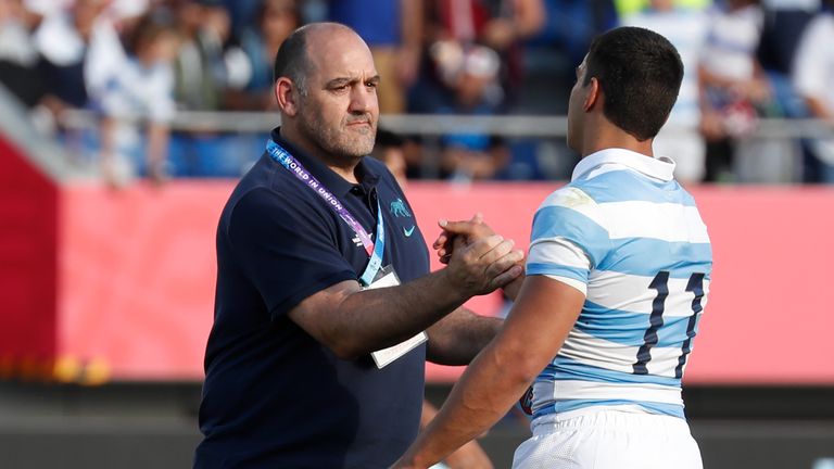 Mario Ledesma (left) congratulates Santiago Carreras after Argentina's win over the USA