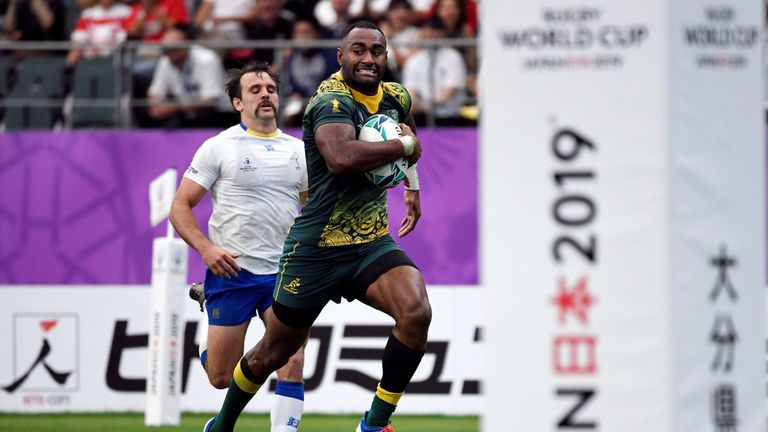 Tevita Kuridrani scores a try against Uruguay