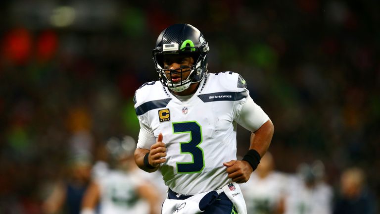 Russell Wilson threw three touchdowns as the Seahawks eased to a win