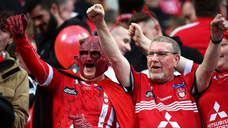 MANCHESTER, ENGLAND - OCTOBER 12: Salford Red Devils fans show their support prior to Betfred Super League Grand Final between St Helens and Salford Red Devils at Old Trafford on October 12, 2019 in Manchester, England. (Photo by Clive Brunskill/Getty Images)