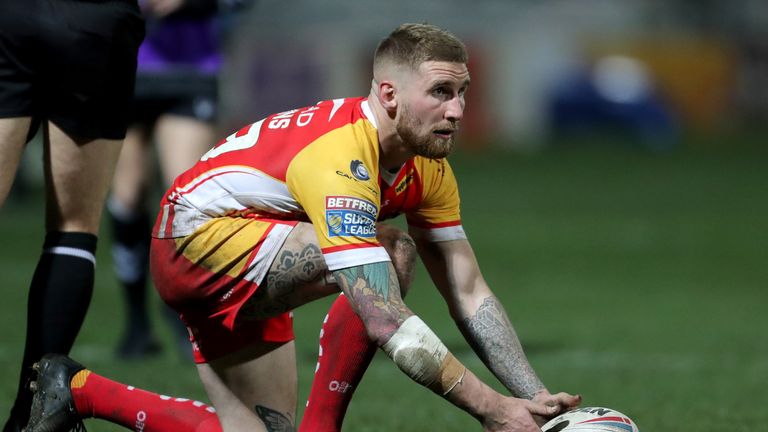 Catalan Dragons Sam Tomkins kicks during the Betfred Super League match at Belle Vue, Wakefield. PRESS ASSOCIATION Photo. Picture date: Thursday February 21, 2019. See PA story RUGBYL Wakefield. Photo credit should read: Richard Sellers/PA Wire. RESTRICTIONS: Editorial use only. No commercial use. No false commercial association. No video emulation. No manipulation of images.