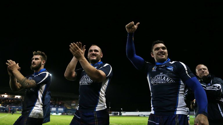 Picture by Vaughn Ridley/SWpix.com - 29/10/2013 - Rugby League - Rugby League World Cup - Tonga v Scotland - Derwent Park, Workington, England - Scotland's Brett Carter, Dale Ferguson and Danny Brough celebrate victory.