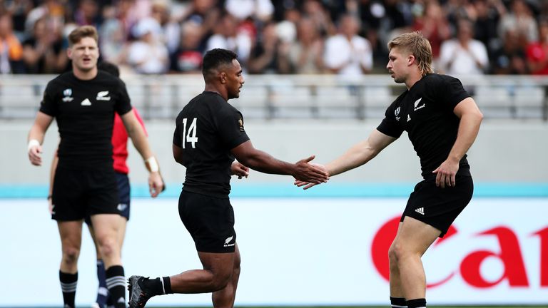 Sevu Reece of New Zealand is congratulated by his team mate Jack Goodhue after scoring his side's first try during the Rugby World Cup 2019 Group B game between New Zealand and Namibia at Tokyo Stadium on October 06, 2019 in Chofu, Tokyo, Japan.
