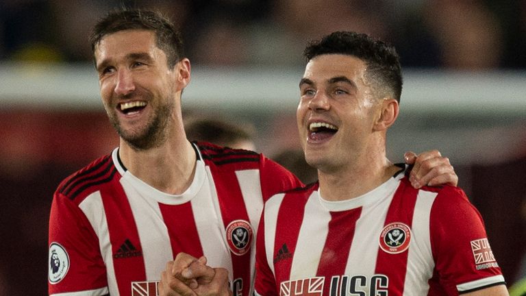 Chris Basham and John Egan after Sheffield United beat Arsenal 