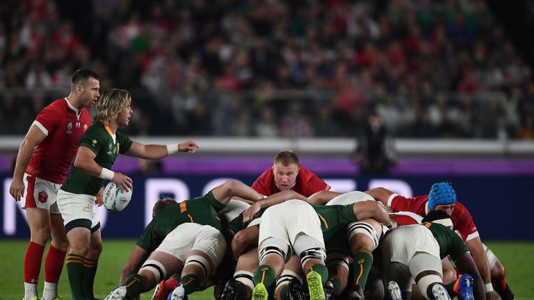 South Africa's scrum-half Faf de Klerk (2nd L) prepares to feed the ball into a scrum during the Japan 2019 Rugby World Cup semi-final match between Wales and South Africa at the International Stadium Yokohama in Yokohama on October 27, 2019. (Photo by CHARLY TRIBALLEAU / AFP) (Photo by CHARLY TRIBALLEAU/AFP via Getty Images)