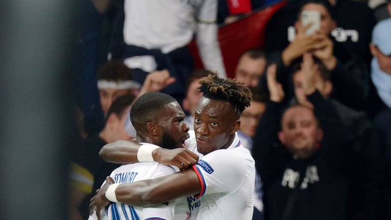 Chelsea's Tammy Abraham celebrates with team-mate Fikayo Tomori after scoring a against Lille