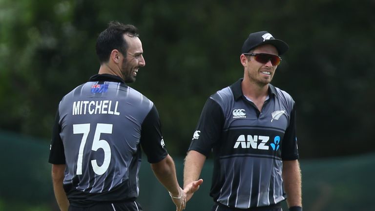 Tim Southee of New Zealand celebrates with team mate Mitchell Santner after takes a catch to dismiss Dasun Shanaka of Sri Lanka during the T20 Tour match between Sri Lanka Board President's XI and New Zealand at Marians Cricket Club Ground on August 29, 2019 in Katunayake, Sri Lanka
