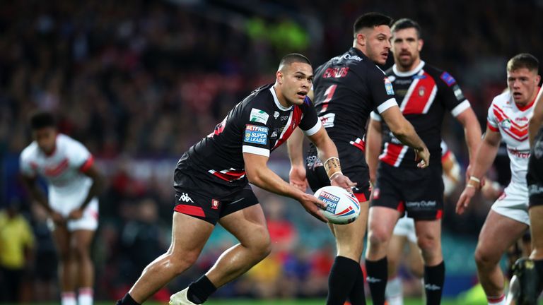 MANCHESTER, ENGLAND - OCTOBER 12: Tui Lolohea of Salford Red Devils looks to pass the ball during Betfred Super League Grand Final between St Helens and Salford Red Devils at Old Trafford on October 12, 2019 in Manchester, England. (Photo by Clive Brunskill/Getty Images)