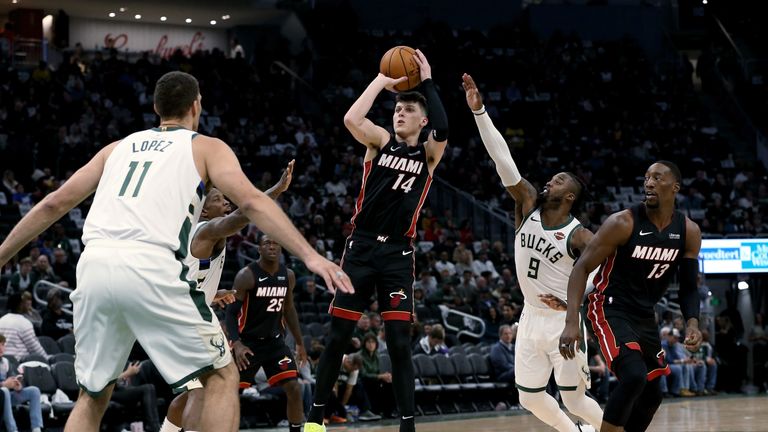 Tyler Herro of the Miami Heat attempts a shot in the third quarter against the Milwaukee Bucks 