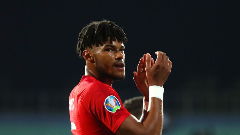 Tyrone Mings acknowledges England supporters following England's 6-0 win over Bulgaria in Sofia