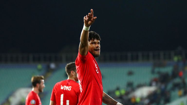 Tyrone Mings acknowledges England supporters following England's 6-0 win over Bulgaria in Sofia