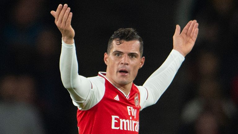 Xhaka reacts to the crowd after being substituted by Unai Emery during their game against Crystal Palace