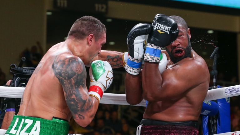 October 12, 2019; Chicago, IL, USA; Oleksandr Usyk and Chazz Witherspoon during their October 12, 2019 Matchroom Boxing USA fight at the Wintrust Arena. Mandatory Credit: Ed Mulholland/Matchroom Boxing USA