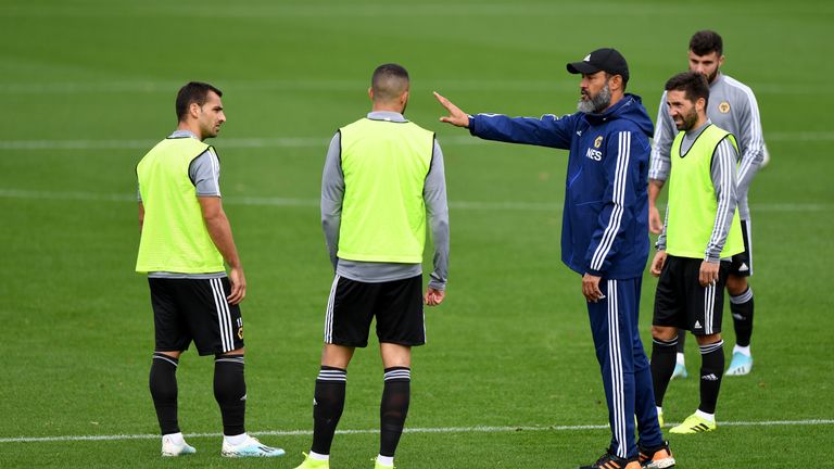 Nuno Espirito Santo gives instructions to his squad before they flew to Turkey