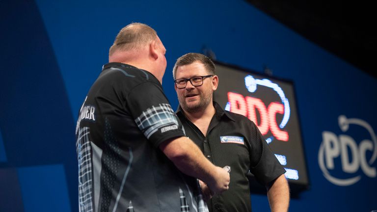 James Wade didn't have everything his own way before eventually seeing off John Henderson