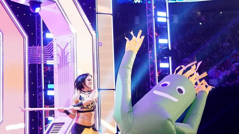Seeking to start a new chapter, Bayley debuts a new look and slaughters the Bayley Buddies prior to her championship match against Charlotte Flair.
