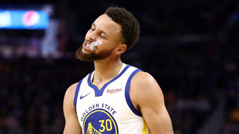 Stephen Curry reacts during the Golden State Warriors' clash with the Phoenix Suns