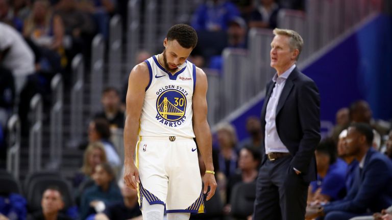 A dejected Stephen Curry and head coach Steve Kerr pictured during the Warriors&#39; heavy loss to the LA Clippers