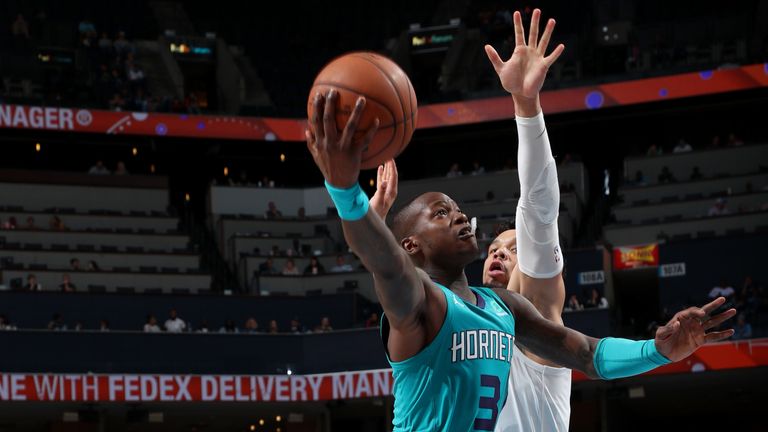 Terry Rozier scores with a lay-up against Memphis