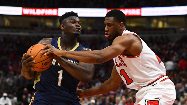 Zion Williamson protects the ball from the Chicago Bulls&#39; defense