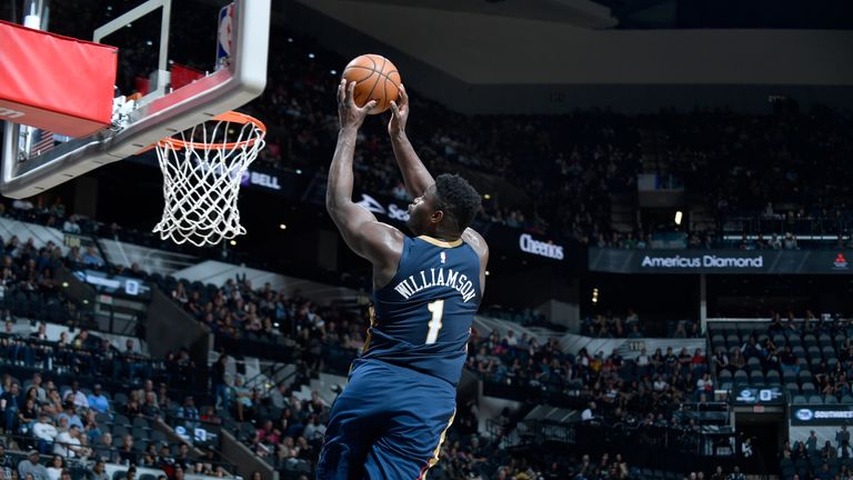 Zion Williamson finishes an alley-oop at the rim from Lonzo Ball&#39;s long pass