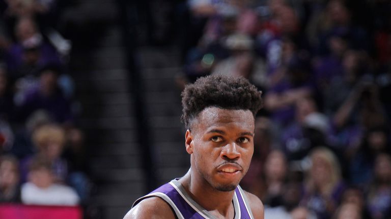 Buddy Hield celebrates a basket in the Kings' win over the Hawks