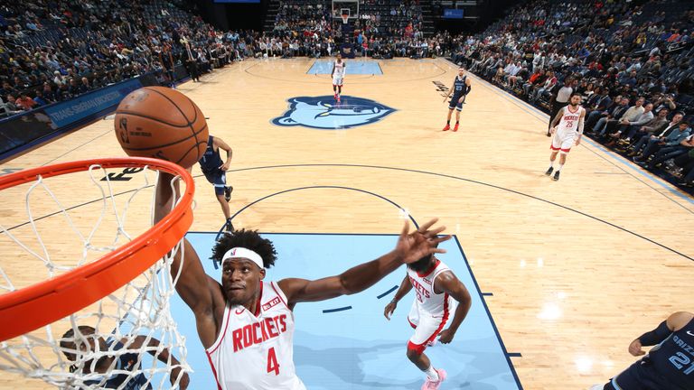 Danuel House finishes at the rim against Memphis