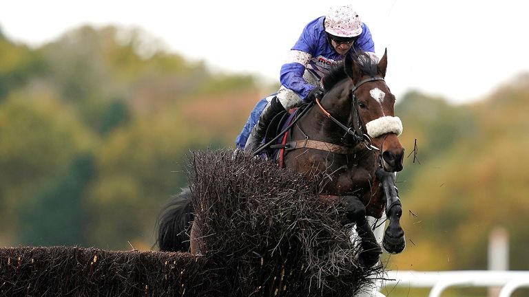 ASCOT, ENGLAND - NOVEMBER 02: Lorcan Williams riding Diego De Chamrmil (R) who went on to win The Byrne Group Handicap Chase force Bryony Frost on Capeland (L) to both crash through the end of the fence along with the plastic wing, the winner survived a stewards enquiry after the race at Ascot Racecourse on November 02, 2019 in Ascot, England. (Photo by Alan Crowhurst/Getty Images)