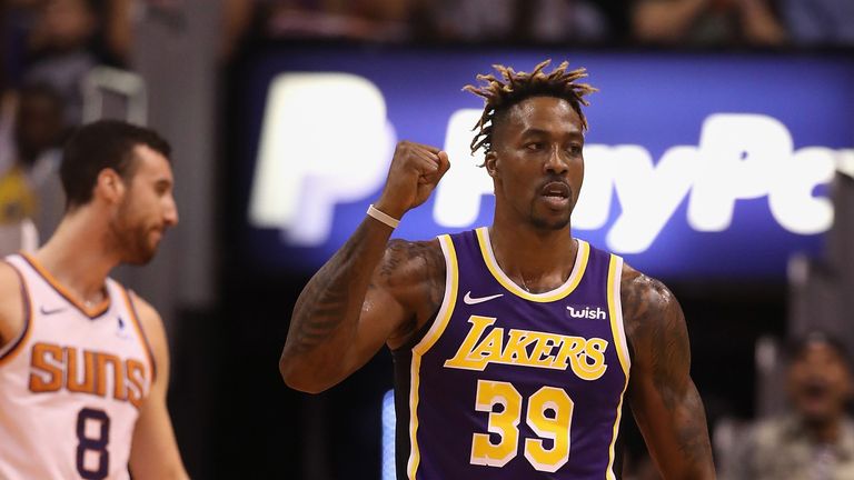 Dwight Howard celebrates a basket during the Los Angeles Lakers&#39; victory over the Phoenix Suns