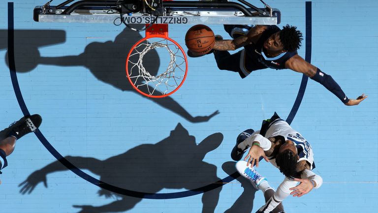 Ja Morant scores at the rim against the Timberwolves