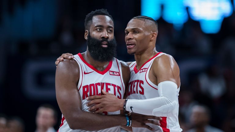 James Harden and Russell Westbrook share a word during a Rockets game